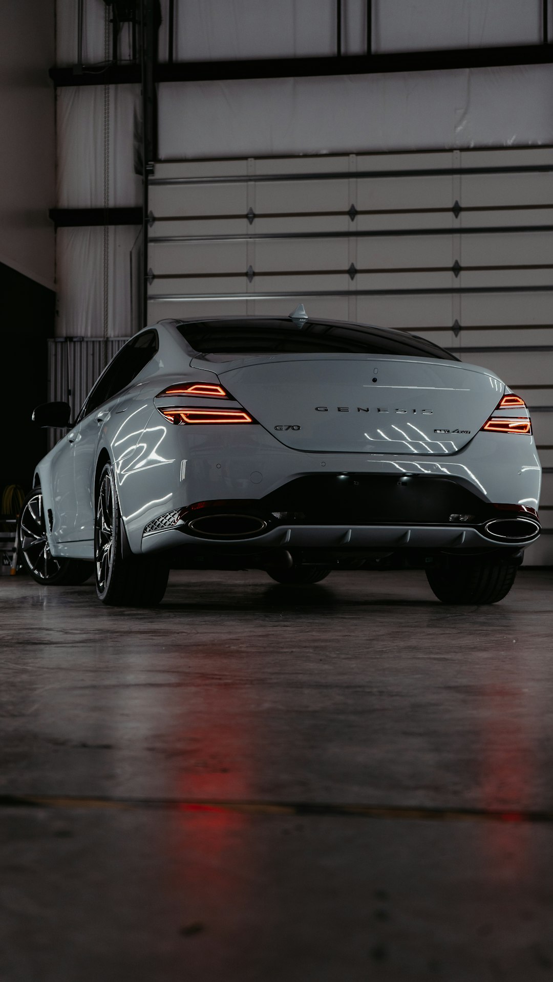 a-white-sports-car-parked-in-a-garage-bsp2hv2qxto